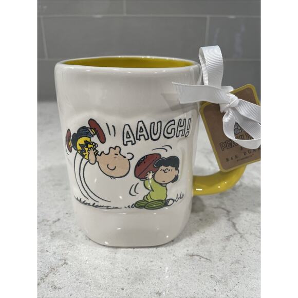 FOOTBALL SEASON Peanuts X Rae Dunn Lucy Charlie Brown AAUGH! Snatch Kick Mug NEW - Picture 1 of 6